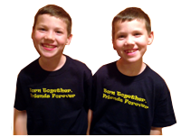 "Born Together, Friends Forever" kids tshirt; gold text on navy shirt